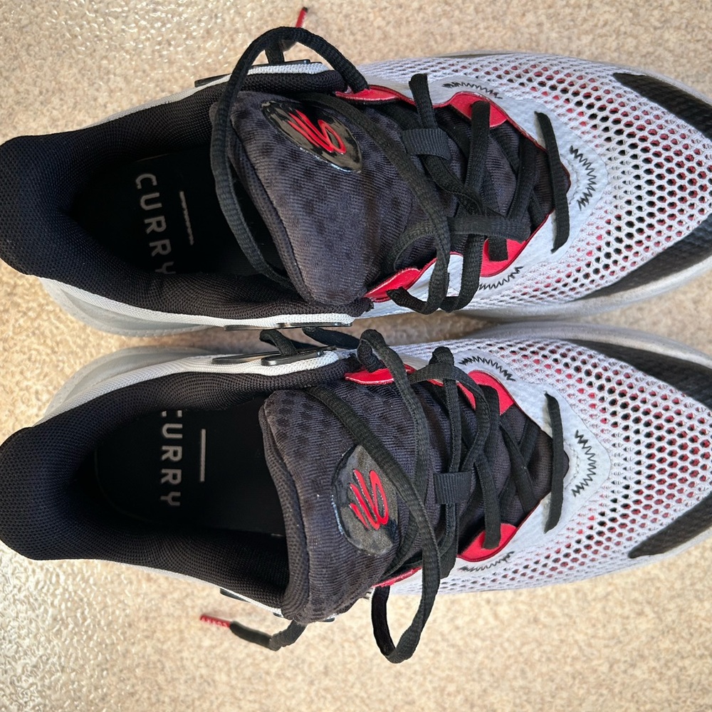 Under Armor Curry 24s - Slightly used and in great condition.